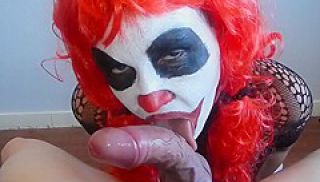 Clown Gives Blowjob To Mysterious Masked Man And Gets What He Deserves