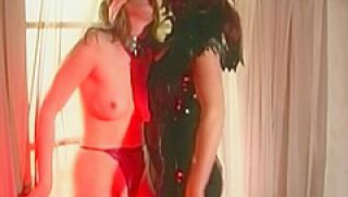 A Stunning Lady In A Latex Dress Satisfies Another Lady With Her Sex Toy