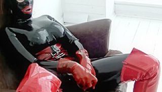 Girl Full Encased In Rubber Latex Catsuit With Red Overknee High Heels Masturbates With Red Dildo
