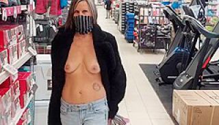 Topless Woman Trying Clothes In The Store!
